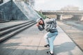 Male rapper posing on the street, urban dancing