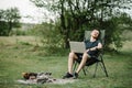 Male relaxing and work on vacation. Young man using online banking for sending money everywhere. Male traveler blogger work remote