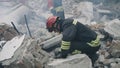 Male rescuers removing concrete rubble Royalty Free Stock Photo