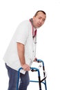 Male revised nurse is limping Royalty Free Stock Photo