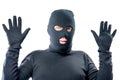 Male robber held up his hands, in black clothes