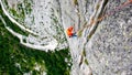 Male rock climber on a hard and steep climbing route in the granite walls of the Val Bregaglia in Switzerland Royalty Free Stock Photo