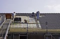 Male roofers fitting tiles Royalty Free Stock Photo