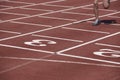 Male runner finalizing a race in a running track Royalty Free Stock Photo