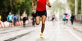 male runner leader running marathon race