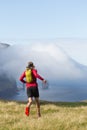 Trail runner running at Faroe islands
