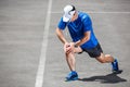 Male runner stretching. Royalty Free Stock Photo