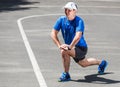 Male runner stretching Royalty Free Stock Photo