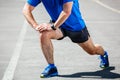 Male runner stretching Royalty Free Stock Photo