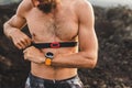 Athlete runner wearing chest heart rate monitor