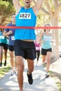 Male Runner Winning Marathon Royalty Free Stock Photo