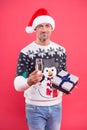 Male santa hat drink champagne. santa man ready for holiday celebration. xmas party is on. merry christmas. happy new Royalty Free Stock Photo