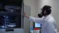 Male scientist in a gas mask in laboratory Royalty Free Stock Photo