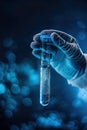 male scientist holding a test tube with water