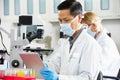 Male Scientist Using Tablet Computer In Laboratory Royalty Free Stock Photo