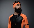 Male in scuba diving mask and orange neopren diving suit. Royalty Free Stock Photo