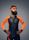 Male in scuba diving mask and orange neopren diving suit. Royalty Free Stock Photo