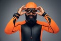 Male in scuba diving mask and orange neopren diving suit. Royalty Free Stock Photo