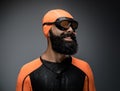 Male in scuba diving mask and orange neopren divingr suit. Royalty Free Stock Photo