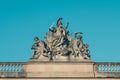 Male sculptures with weapons on historic building Royalty Free Stock Photo