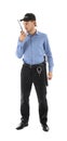 Male security guard with portable radio transmitter on white background Royalty Free Stock Photo