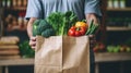 male seller hands holding a paper bag with vegetables in the market. delivery of healthy and fresh food. AI. Royalty Free Stock Photo