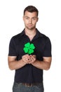 Male showing green clover leaf Royalty Free Stock Photo