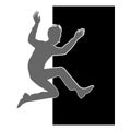 A male silhouette jumping into a black door