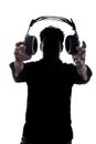 Male in silhouette showing headphones