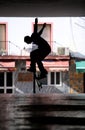 Male skateboarder in dark subway