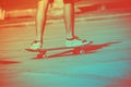 Male skateboarder on a skateboard is riding at sunset Royalty Free Stock Photo