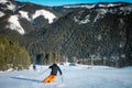 Male skier carving down the slope Royalty Free Stock Photo