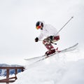 Male skier skiing downhill trough deep powder snow. Royalty Free Stock Photo