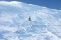 Male skier on slope at resort. Winter vacation