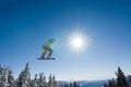 Male Snowboarder Catches Big Air. Royalty Free Stock Photo
