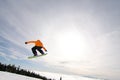 Male Snowboarder Catches Big Air. Royalty Free Stock Photo