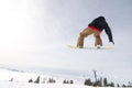 Male Snowboarder Catches Big Air. Royalty Free Stock Photo