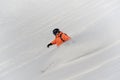 Male snowboarder riding down the snow slope Royalty Free Stock Photo