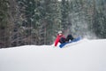 Male snowboarder falls on the slopes during the jumping Royalty Free Stock Photo