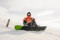 Male snowboarder riding down the mountain hill on the board. Snowboarding in Georgia, Goderdzi