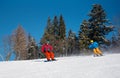 Snowboarder riding in the mountains on a sunny winter day Royalty Free Stock Photo