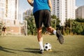 Male soccer player hits the ball on the field Royalty Free Stock Photo