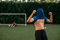 Male soccer player hits the goal on the field Royalty Free Stock Photo