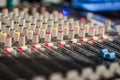 Male sound engineer hands working on sound mixer Royalty Free Stock Photo
