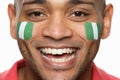 Male Sports Fan With Nigerian Flag Painted O