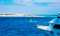 Male sportsman windsurfing in blue sea Royalty Free Stock Photo