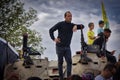 Male standing on top of a tank during Golani soldier ceremony in Israel