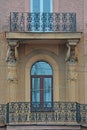 Male statues on the balcon of house on Mytninskaya Embankment in Saint Petersburg, Russia