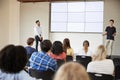Male Student Giving Presentation To High School Class In Front Of Screen Royalty Free Stock Photo