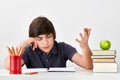 Male student kid with ADHD is feeling confused and angry Royalty Free Stock Photo